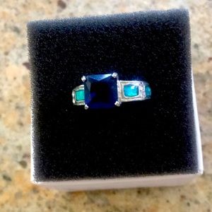 Marine Stone with cubic zirconia and light blue setting